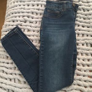Dark blue gently used jegging